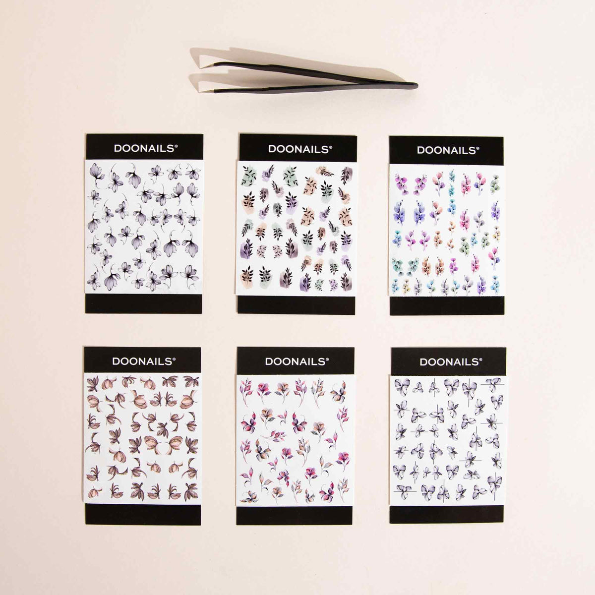 Kit de Tatouages à ongles + pincette gratuite