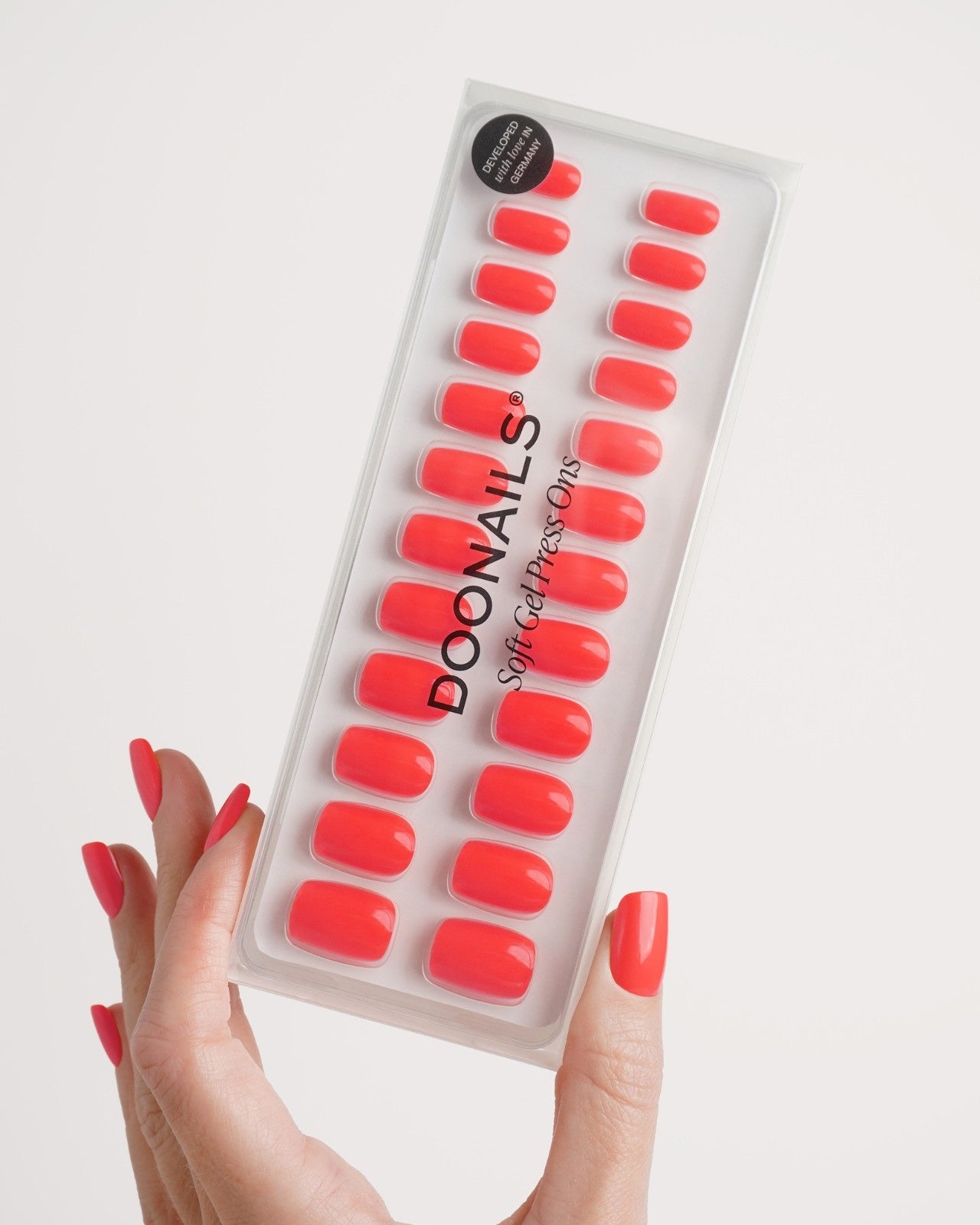 Press Ons en gel souple Sunset Coral Courte Carré - Doonails France