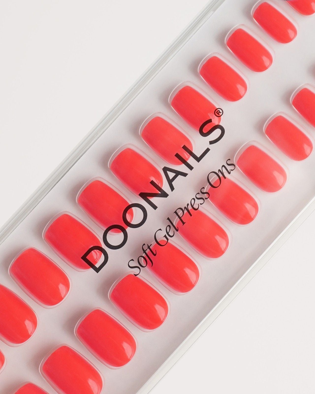 Press Ons en gel souple Sunset Coral Courte Carré - Doonails France